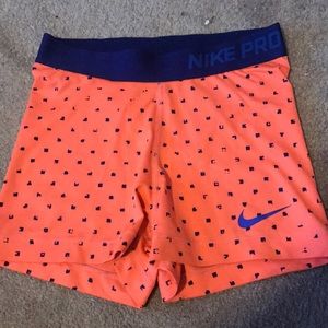 Dotted orange Nike pros size sm